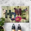 Covoraș intrare 40x60cm decorat cu flori, fluturi și cuvântul HOME