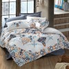Lenjerie de pat dublă din bumbac 100% ranforce, Cotton Box, design oriental în nuanțe de albastru indigo, portocaliu și bej, cu motive florale și modele ornamentale.