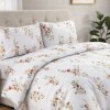 Lenjerie de pat bumbac 100% Donna Bleu cu flori si frunze bej Deluxe Pucioasa