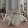 Lenjerie de pat din bumbac ranforce Pucioasa, design broderii florale verde și alb pe fundal verde deschis