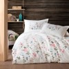 Lenjerie de pat din bumbac 100% ranforce, Pucioasa, model Palitra V1, în nuanțe de alb, roz, verde și albastru cu design floral pastelat.