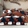 Lenjerie pat finet cu elastic bleumarin caramiziu, model cercuri caramizii si carouri alb negru, 6 piese
