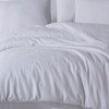 Lenjerie de pat de lux din jacquard satin, Clasy Home, model Arte, în nuanțe de alb cu design floral sofisticat.