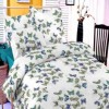 Lenjerie de pat dublu bumbac 100%, model cu fluturi colorați în albastru și verde pe fundal alb.