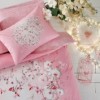 Lenjerie de pat dublu bumbac 100% ranforce fosforescentă TAC Orkide cu design floral roz.
