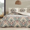 Lenjerie de pat din bumbac 100% ranforce model Valeria cu design floral detaliat în nuanțe de bej, verde și maro.
