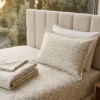 Lenjerie de pat dubla bumbac 100% satinat cu flori galbene delicate, 4 piese, fabricata in Romania