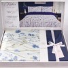 Lenjerie de pat dubla bumbac 100% reversibila flori de camp albastre si cearceaf de pat uni, 4 piese, fabricata in Romania
