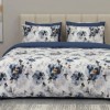 Lenjerie de pat dubla cu elastic din bumbac 100% reversibila model flori albastre bleumarin elegant, 4 piese, fabricata in Romania