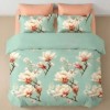 Lenjerie de pat dublu din finet cu 6 piese model cu flori de magnolie pe fundal verde