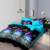Lenjerie de pat dublu din finet cu 6 piese, design vibrant cu fluturi mov și fundal albastru.