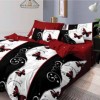 Lenjerie de pat dublu din finet cu 6 piese, decorată cu fluturi roșii pe fond negru și alb, perfectă pentru un dormitor modern și sofisticat