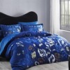 Lenjerie de pat TAC Talin Lacivert cu design floral albastru intens și detalii contrastante, pe bumbac 100% satinat mercerizat, include cearceaf de pat, husă de pilotă și fețe de pernă