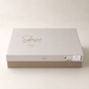 Lenjerie de pat Yoan din bumbac prespalat cu imprimeu digital, crem cu flori delicate si borduri decorative