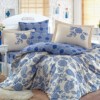 Lenjerie de pat de lux din satin Hobby Home Antonia Dark Blue în nuanțe albastru închis și crem, design floral