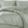 Lenjerie de pat jacquard ranforce verde Clasy Home Melkor V9 pe pat elegant