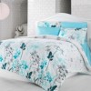 Lenjerie de pat Ranforce Blue Garden cu design floral albastru și turcoaz pe fundal alb