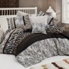 Lenjerie de pat dublu Cheta Kahve NR 162 cu design animal print în nuanțe de maro și alb-negru.