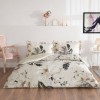 Lenjerie pat 1 persoana TAC Mako Satin Libra Bej cu flori mari si frunze tropicale pe fundal crem