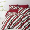 Lenjerie pat Craciun bumbac ranforce Merry Red cu dungi rosii, albe si verzi Cozy Home