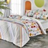Lenjerie de pat din bumbac 100% ranforce cu design colorat și vesel, cu dungi multicolore și modele circulare