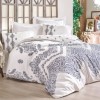 Lenjerie de pat dublu bumbac 100% ranforce Cotton Box Adonis Indigo cu design paisley în nuanțe de albastru și alb.