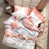 Lenjerie de pat dublu din bumbac 100% ranforce, model Cotton Box Lara v2 Pink, cu motive marine colorate în nuanțe de roz și alb.