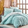 Lenjerie de pat dublu din bumbac 100% ranforce, model Cotton Box Sole Mint, cu motive geometrice în nuanțe de verde mentă și alb.