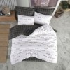 Lenjerie pat Wimper White bumbac ranforce, design modern cu ochi și gene negre pe fundal alb, veselie și contemporaneitate.