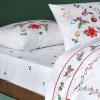 Lenjerie de pat din bumbac 100% ranforce, fosforescenta, model Charm cu motive de Craciun - globuri, steluțe și crenguțe de ilex