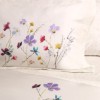 Lenjerie pat dublu satin TAC Pauline lila cu imprimeu floral delicat, flori de camp lila, mov, roz, galben si bleu pe fundal ivory