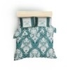 Lenjerie de pat BHPC 024-Green cu nuanțe de verde și alb, design elegant și logo iconic