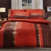 Lenjerie pat bumbac satinat, lenjerie TAC Moreno Taba, design elegant lenjerie pat, lenjerie pat maro portocaliu, lenjerie pat călduroasă