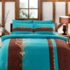 Lenjerie de pat din bumbac 100% satinat model Moreno Turcoaz cu design elegant în nuanțe de turcoaz și maro.