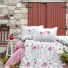 Lenjerie de pat din bumbac ranforce Mina cu design floral și imprimeu de flamingo, în nuanțe de roz, verde și alb