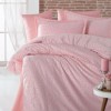 Lenjerie de pat din jacquard satin roz cu motive florale discrete