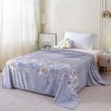 Pătură cocolino lavandă cu imprimeu floral alb și portocaliu – 200x230 cm