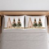 Set 2 fete de perna Craciun Leo 50x70 cm cu trei brazi verzi si bej, fundite champagne si stelute aurii