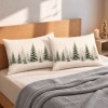 Set 2 fete de perna Craciun Vanya 50x70 cm cu brazi inzapeziti verzi si gri pe fundal alb crem