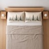 Set 2 fete de perna Craciun Vanya 50x70 cm cu brazi inzapeziti verzi si gri pe fundal alb crem