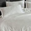 Imagine cu set 2 fețe de pernă din damasc bumbac crem, dimensiuni 70x70 cm, produs Ralex Pucioasa