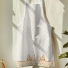 Sort de bucătărie Ginny din bumbac 100%, decorat cu iepurași și flori delicate, ideal pentru un decor festiv de Paște.