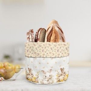 Coș de pâine din bumbac 16x21 cm, model Ginny, cu imprimeu de iepurași, ouă de Paște și fluturi aurii, ideal pentru decorul mesei festive.