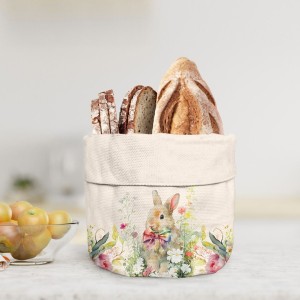 Coș de pâine din bumbac 16x21 cm, model Vinca, cu imprimeu de iepuraș și flori pastelate, ideal pentru decorul mesei de Paște.