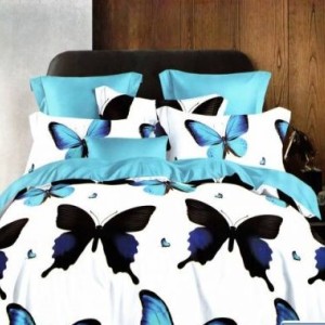 Lenjerie de pat cu fluturi negri și albăstrui pe fundal alb, cu perne albastre