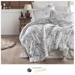 Lenjerie de pat bumbac satinat model Tuluna cu model floral negru pe fundal alb, accente elegante și detalii delicate