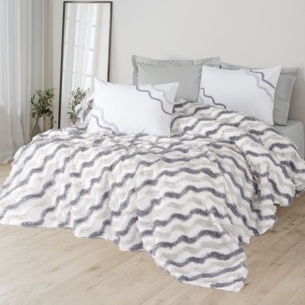 Set Eldon Gri – cuvertură jacquard zig-zag și fețe pernă puff brodate, expus pe pat