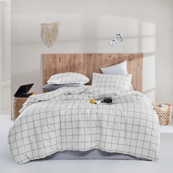 Lenjerie de pat Piga White din bumbac 100% ranforce, brand Enlora Home, cu design modern în carouri alb-negru, ideală pentru un decor minimalist și contemporan.