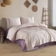 Set cuvertura 220x240cm cu cearceaf pat si fete perna cu ciucuri Bohemline V3 din bumbac bej/mustar, expus pe pat
