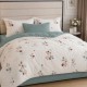 Lenjerie finet cu elastic 6 piese Flori bej 1, model floral bej cu accente turcoaz pe fundal deschis, cu cearsaf crem uni